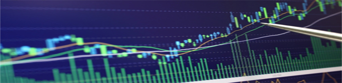 Pen pointing at charts